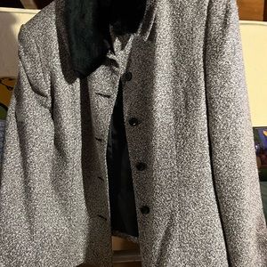 Jacket 100% polyester lining, coat 51% acrylic and 39% polyester 10% rayon